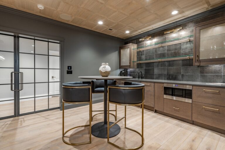 Recreation,Room,With,Large,Wooden,Pool,Table,And,Glass,Doors