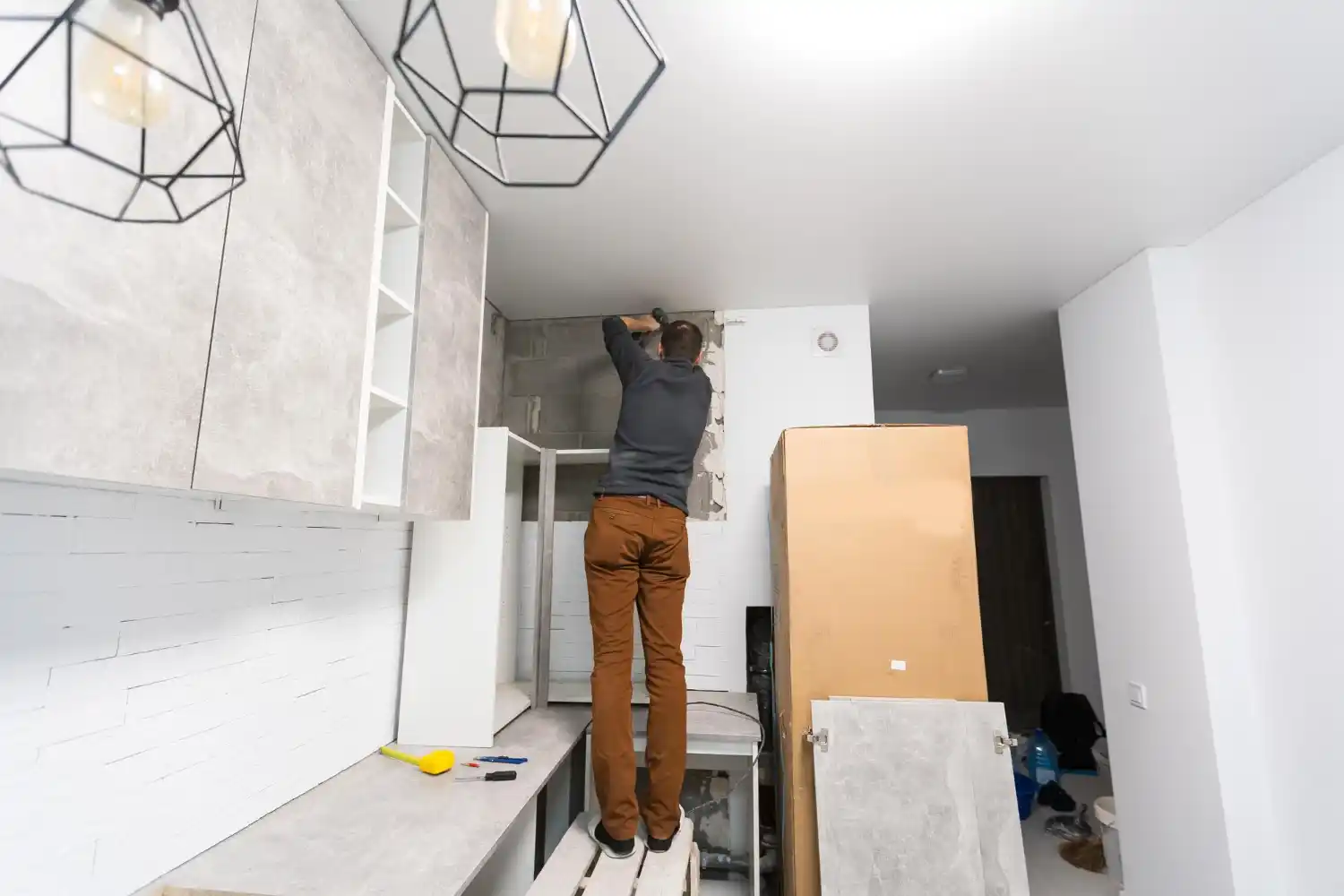 Modern bathroom vanity and cabinetry installation during renovation project
